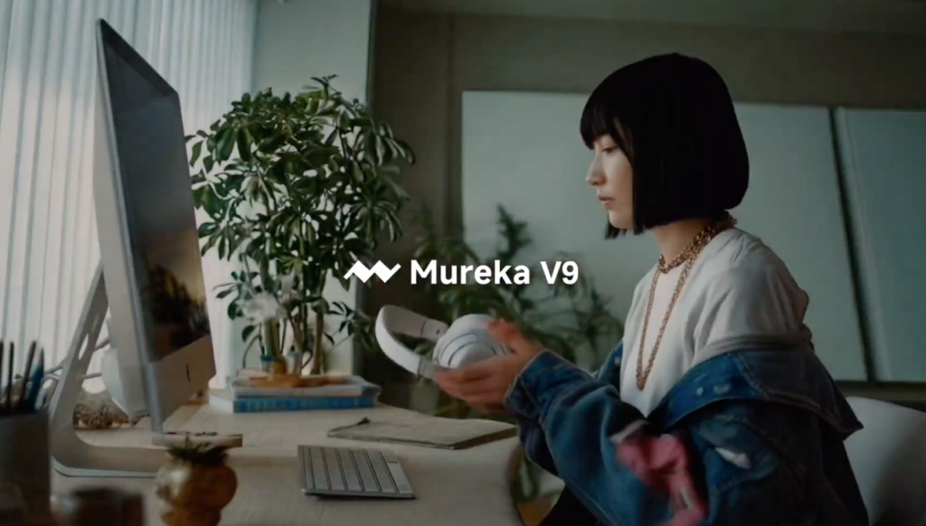 A creator wearing headphones at a desk, looking for a reliable mureka v9 alternative for music production.
