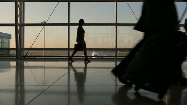 Sonilo product visual showing travelers in an airport